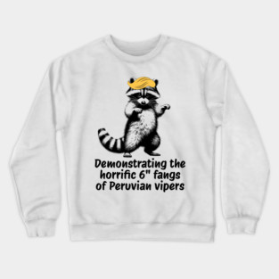 Raccoon mimicking trump's description of the 6" Peru Viper's fangs Crewneck Sweatshirt