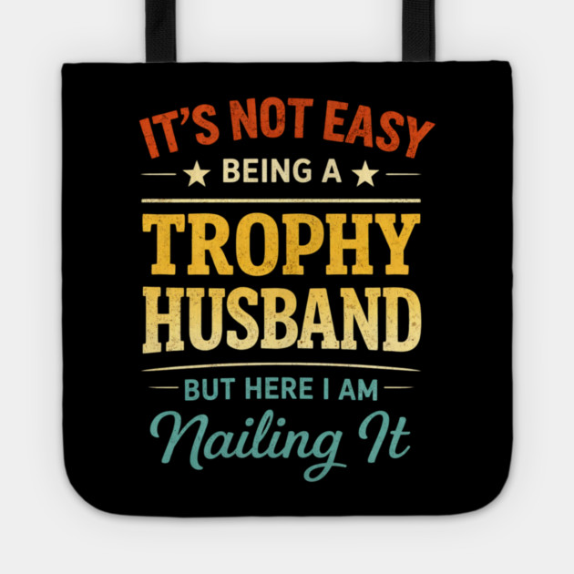 It's Not Easy Being A Trophy Husband But Here I Am Nailing It Tote by ArtistTee ⭐⭐⭐⭐⭐