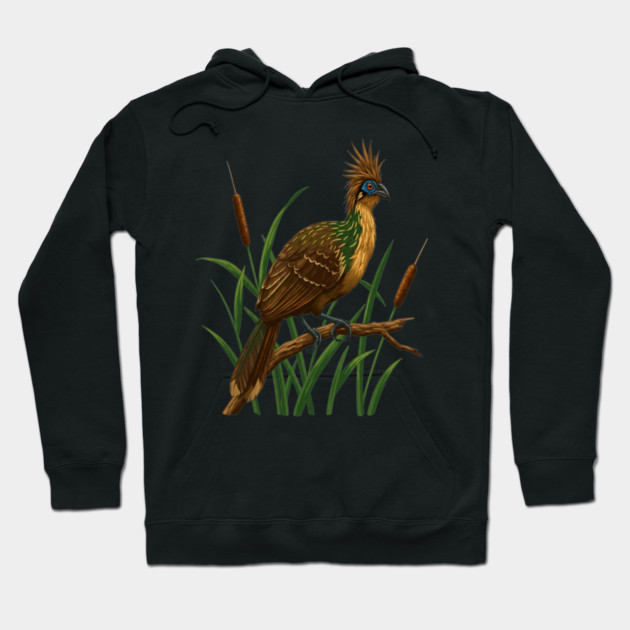 Hoatzin on Branch in Lush Wetland Growth Hoodie by BirdsnStuff