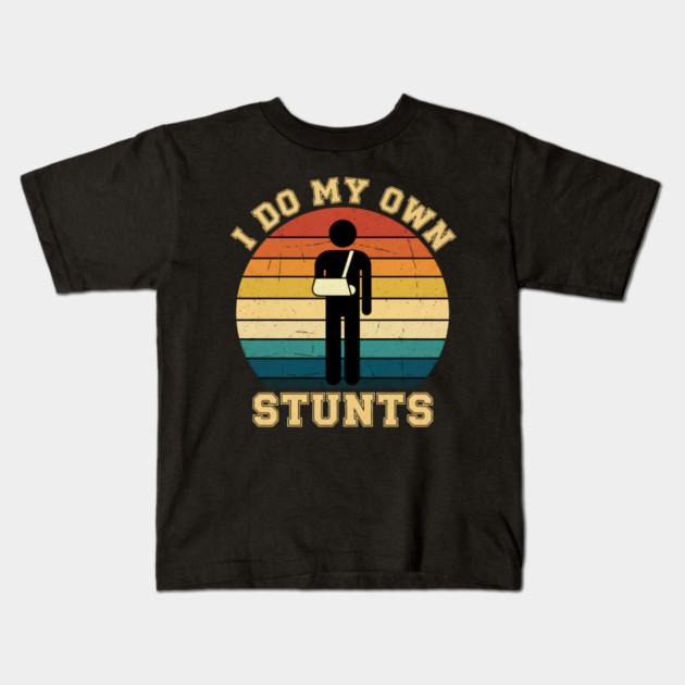 I DO MY OWN STUNTS Kids T-Shirt by aziz's Store 13