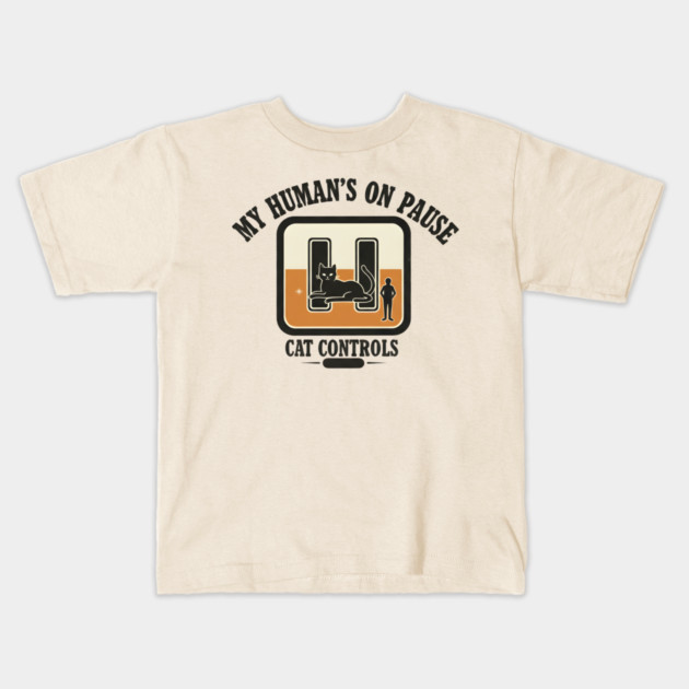 MY HUMAN'S ON PAUSE, CAT CONTROLS Kids T-Shirt by Cataura
