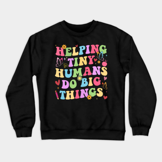Helping Tiny Humans Do Big Things – Groovy Retro Preschool Teacher Crewneck Sweatshirt by ArtistTee ⭐⭐⭐⭐⭐
